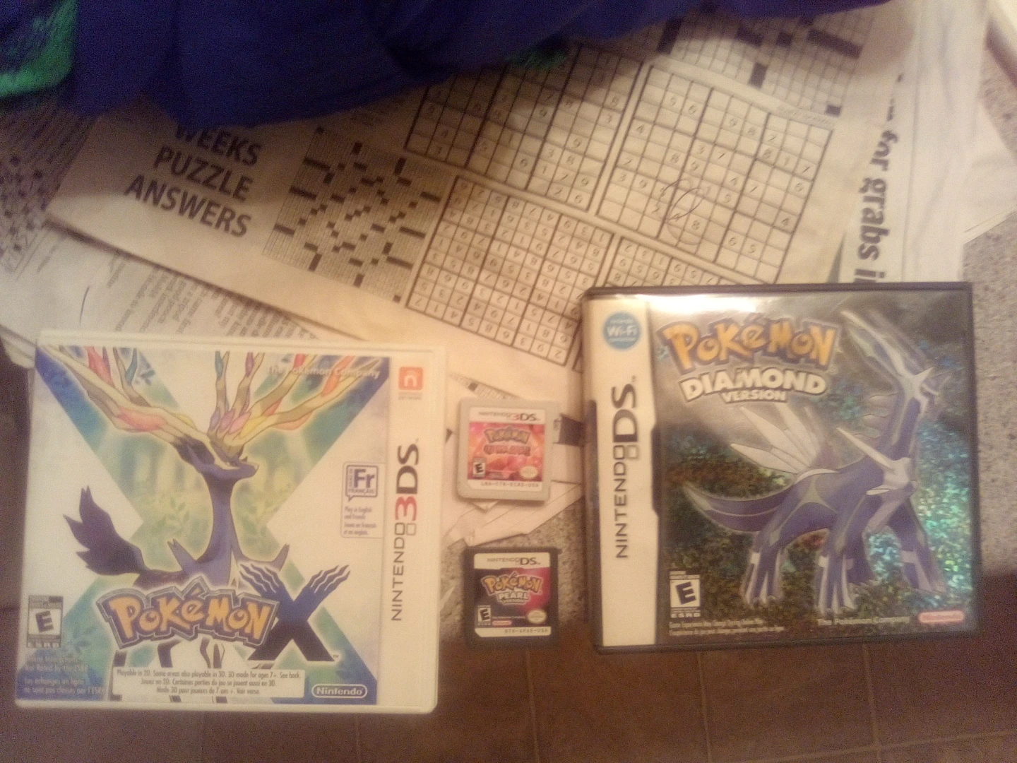 4 Nintendo Pokemon Games: X, Omega Ruby, Pearl, Diamond