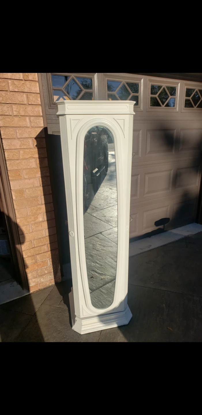 White Rotating Storage Tower with Mirror