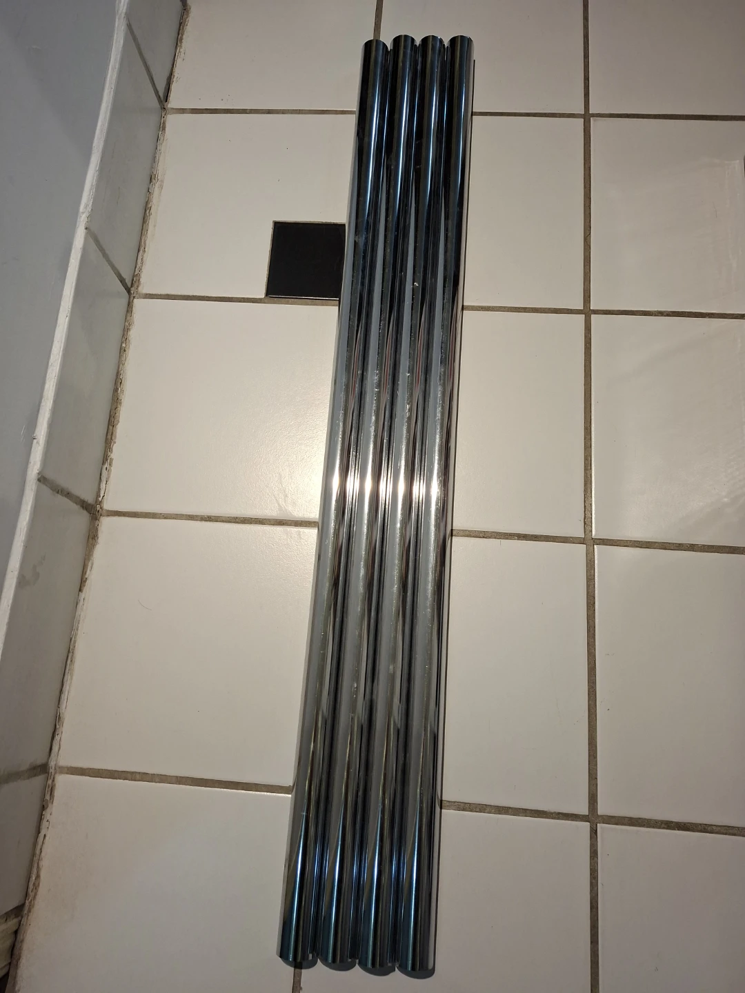Four Stainless Metal Tubes for closet