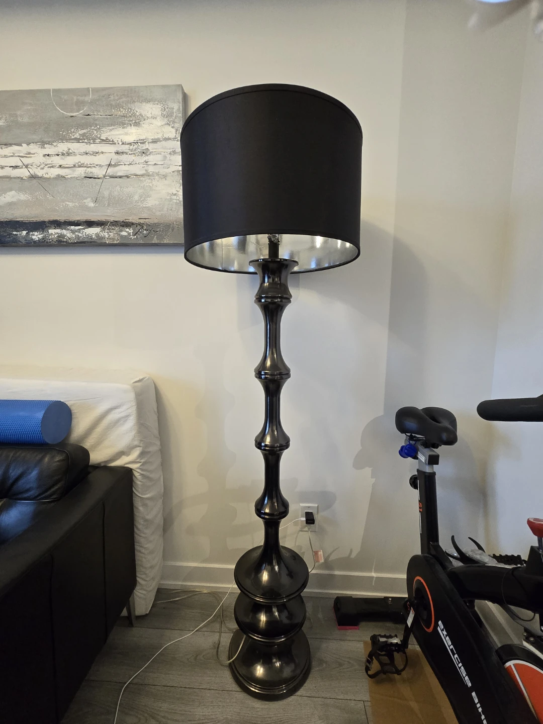 Tall black metal floor lamp
