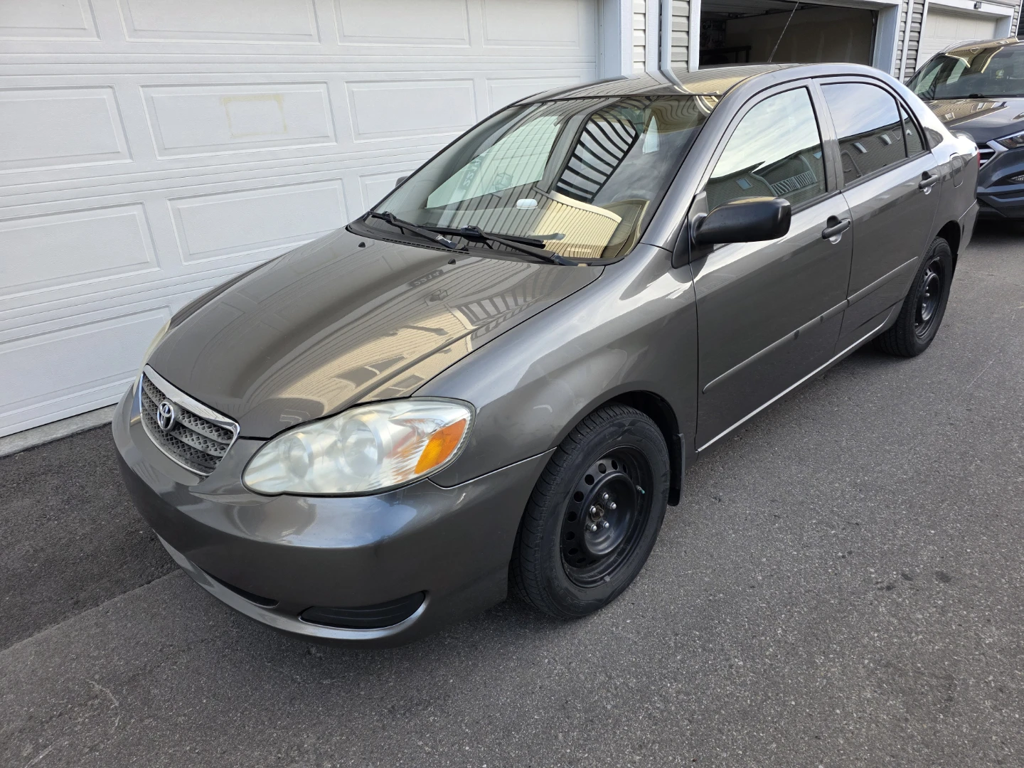 Grey Toyota Corolla 2006 - photo 2