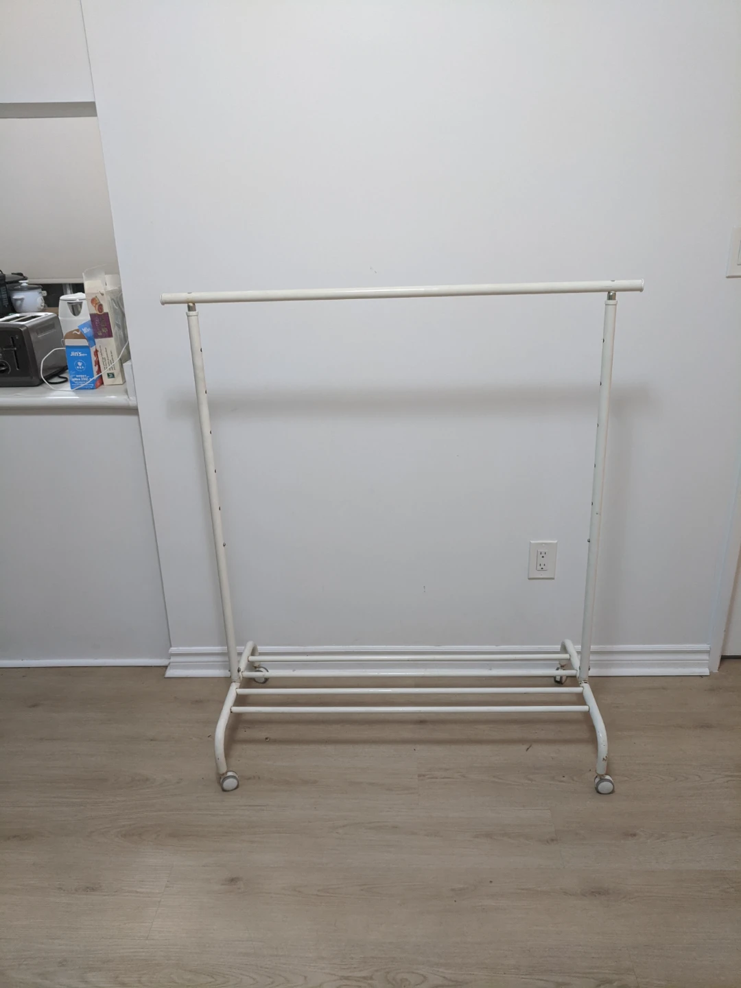 White metal clothing rack with wheels - photo 2