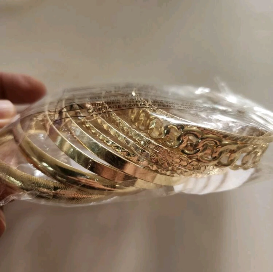 Set of 9 Gold-Tone Metal Bangles - photo 3