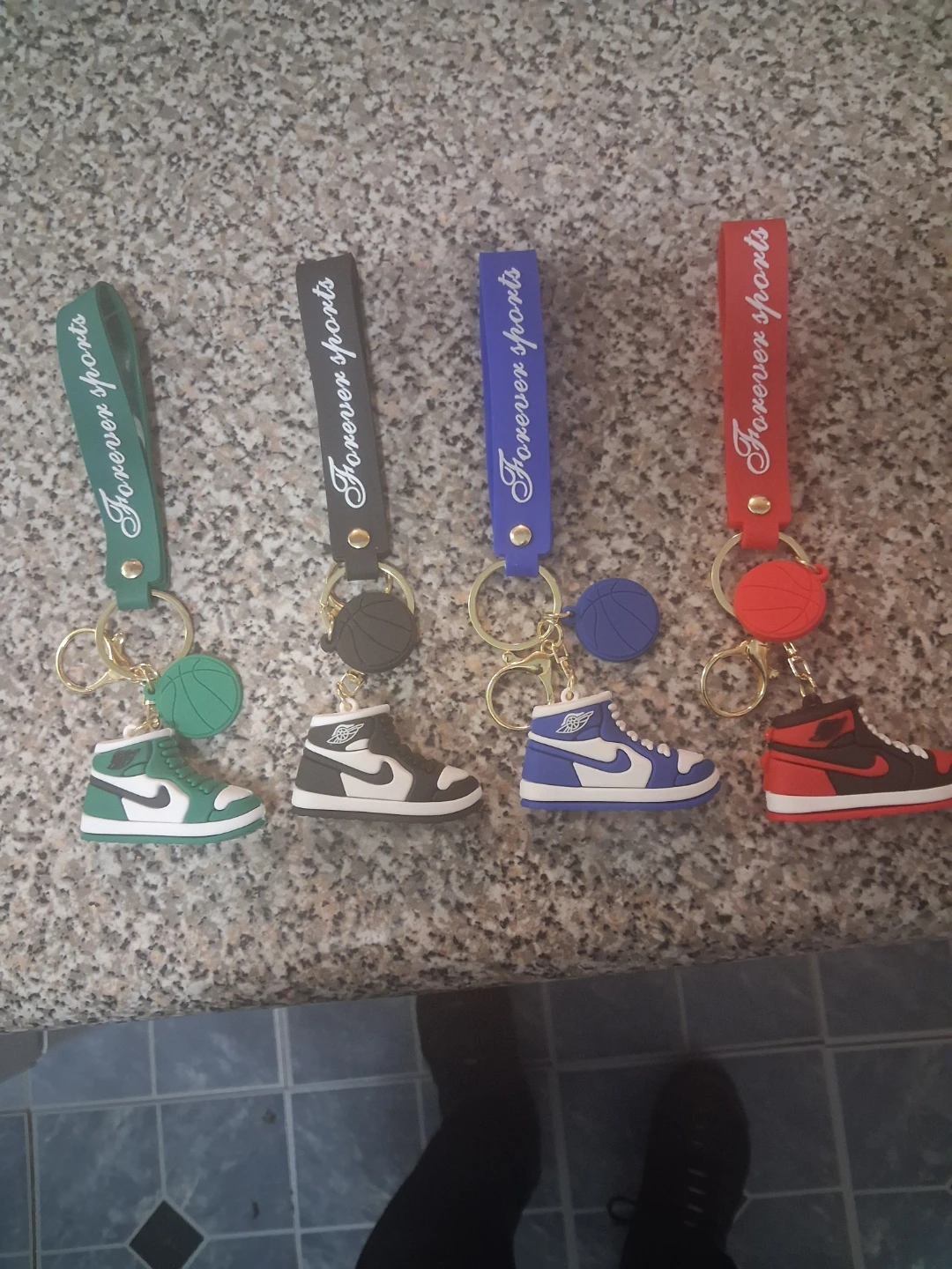Assorted Keychains and hand sanitizers shorts - photo 4