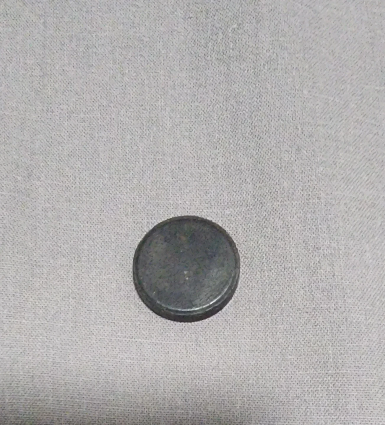 Small circular magnet