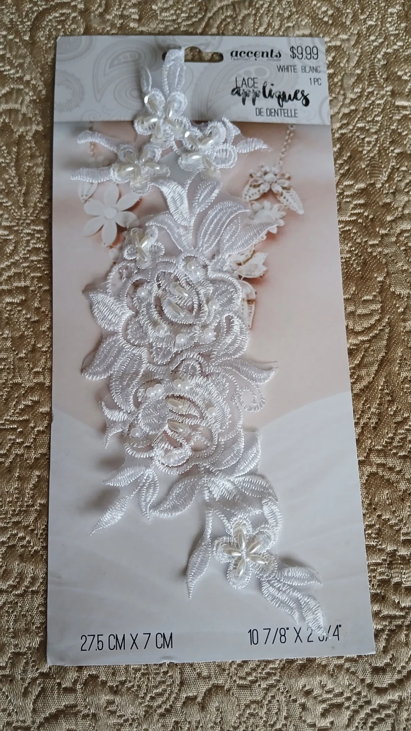 3 White floral appliques for $10.00