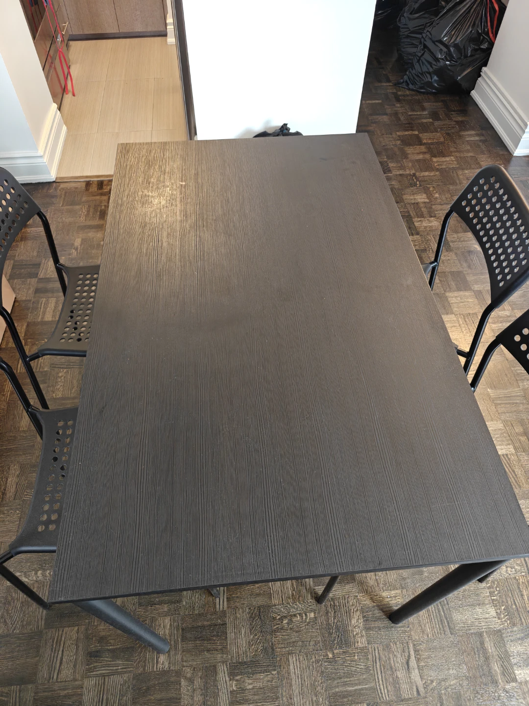 IKEA Black Dining Table with Four Chairs