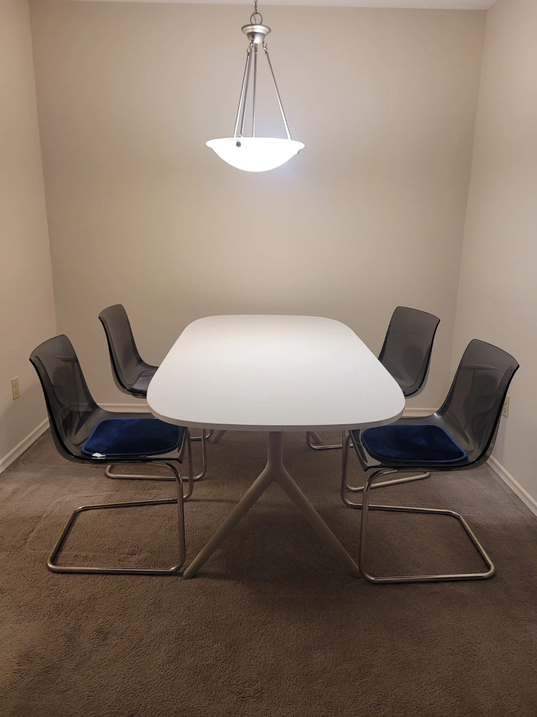 IKea Modern White Dining Table with 4 Transparent Chairs