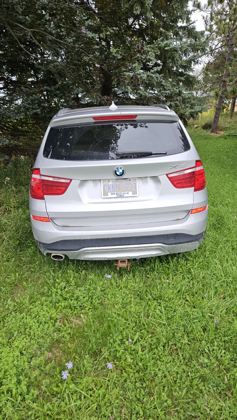 Silver BMW X3 SUV - photo 4