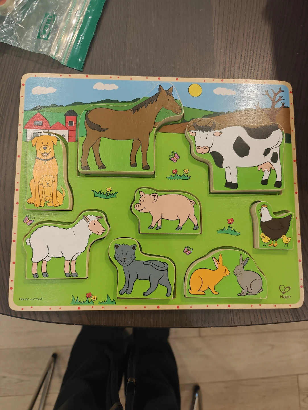 Hape and Melissa & Doug wooden farm puzzles