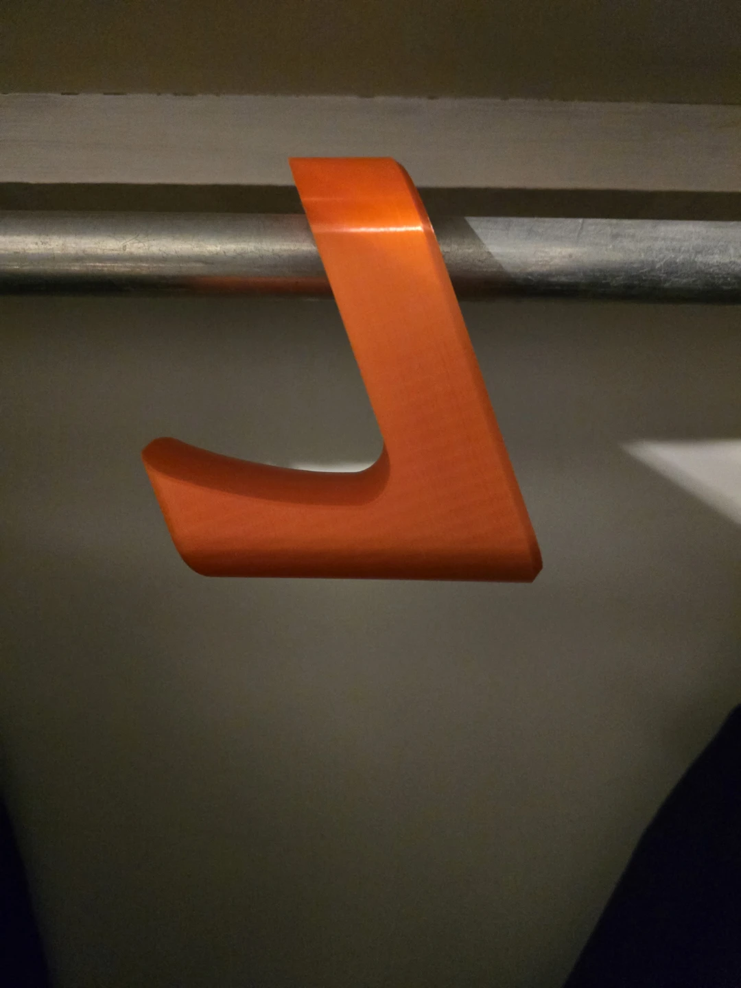 Orange closet gym bag hook
