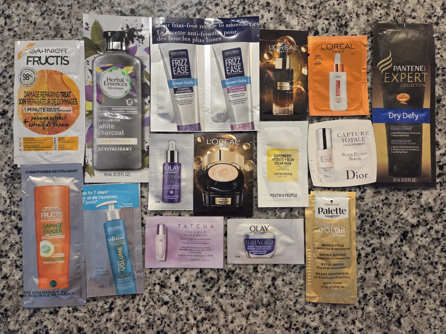 Collection of assorted skincare and haircare samples
