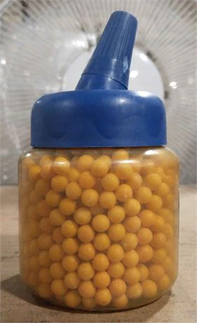 Bottle of Yellow Plastic Airsoft BB 1000 Pellets 6mm