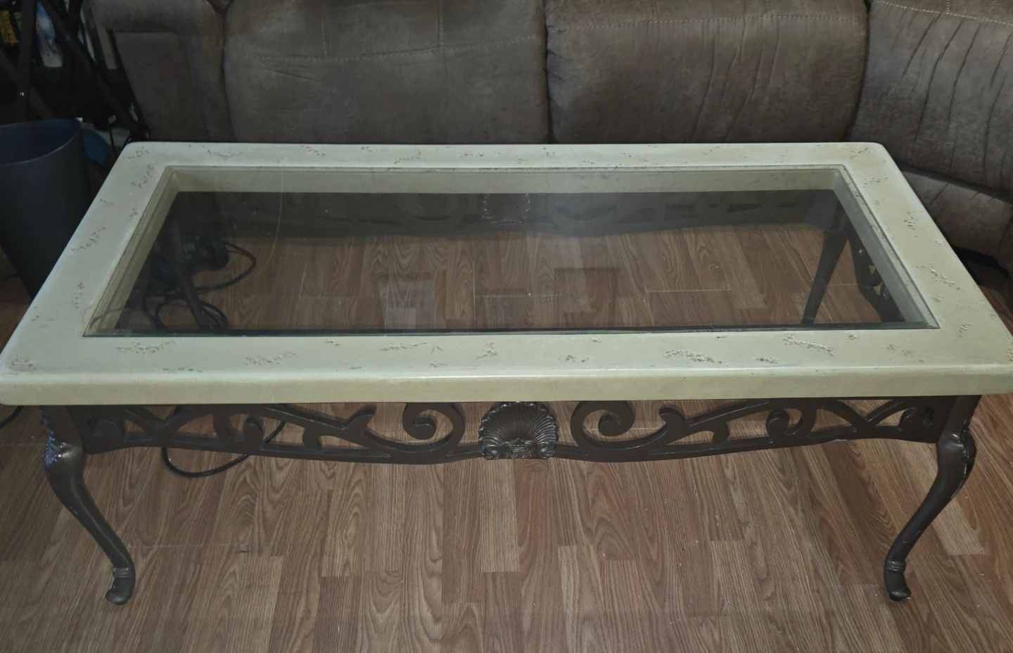 Glass topped coffee table