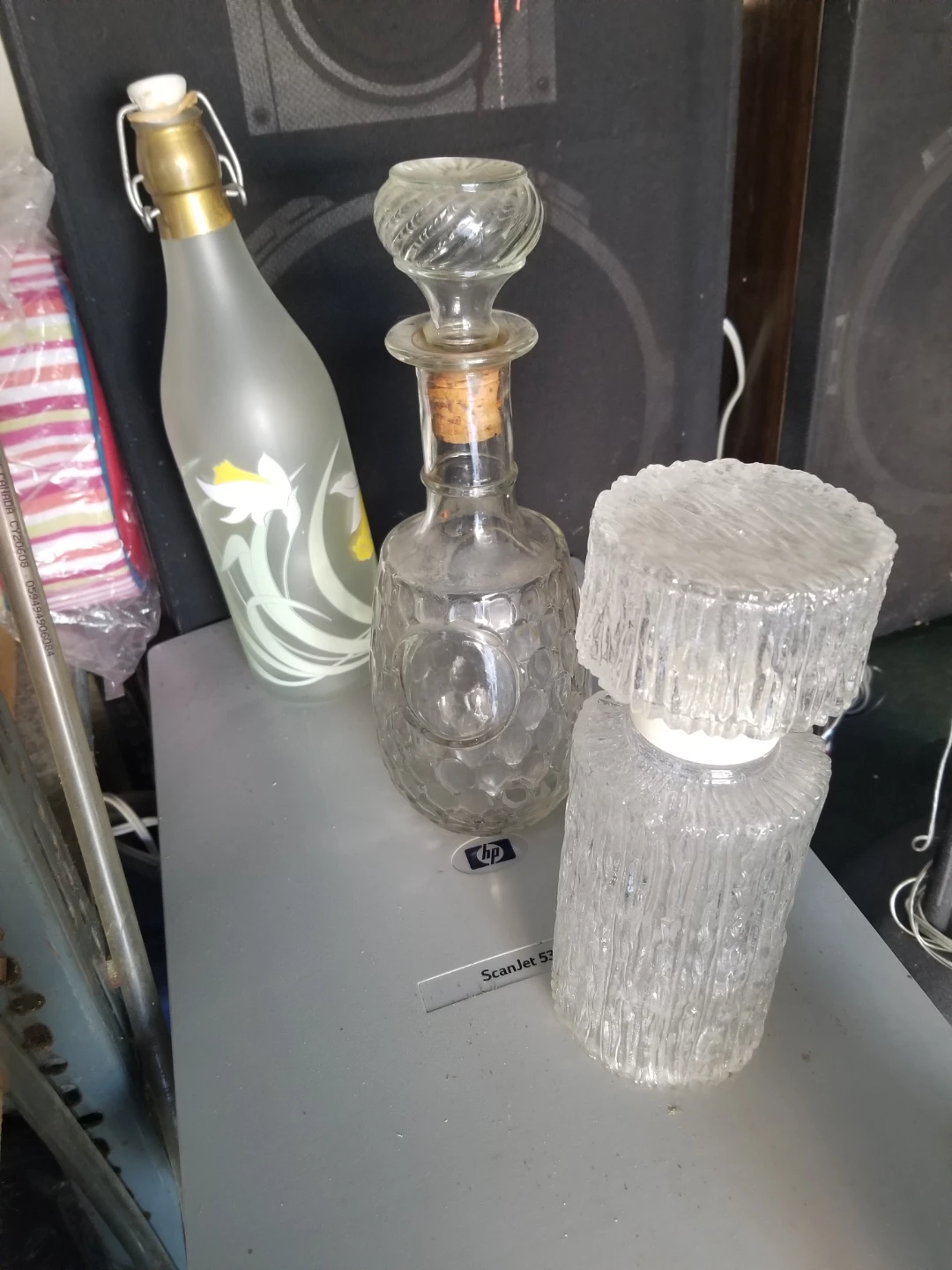 Set of Three Decorative Glass Bottles
