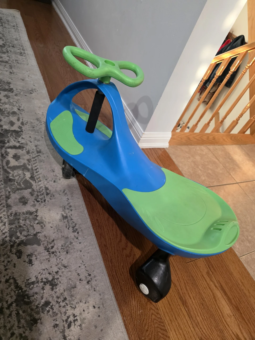 Blue and Green Plastic Wiggle Ride-On Car