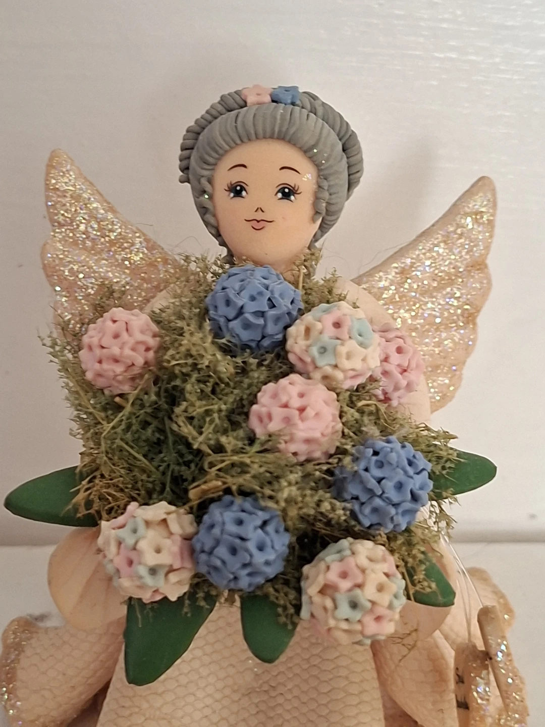 Decorative Angel Figurine with Flowers