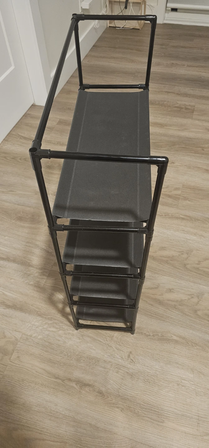 Four-tier black  shoe rack
