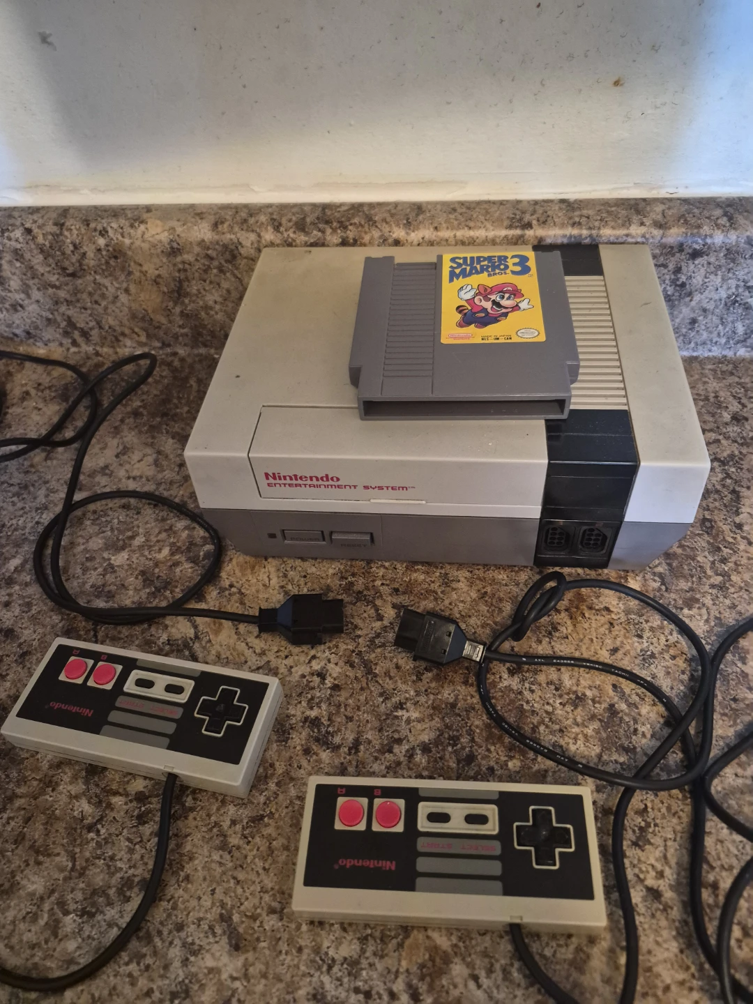 Nintendo Entertainment System Console With Super Mario 3 bros.
