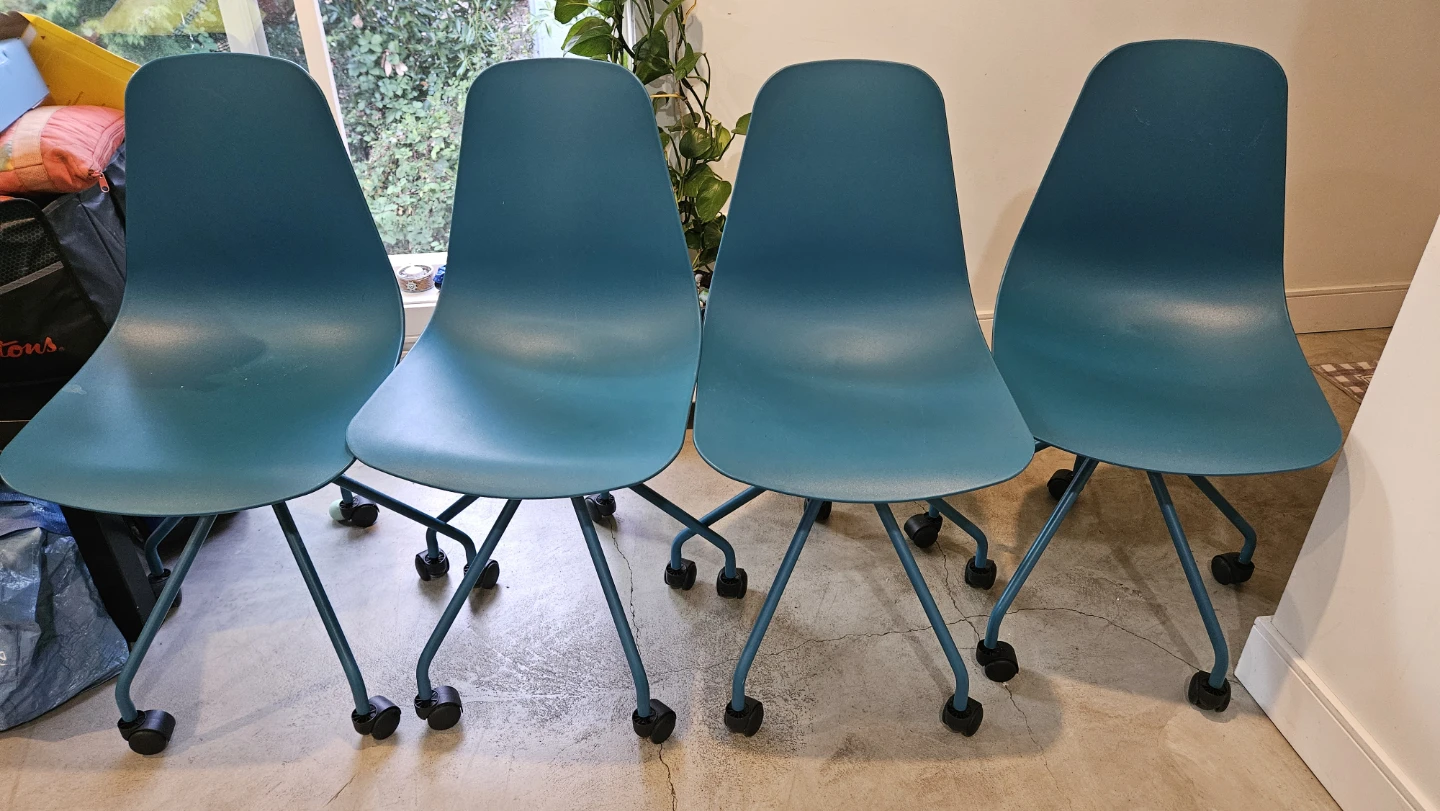 Set of 4 Teal Blue Molded Plastic Office Chairs on Wheels - photo 4