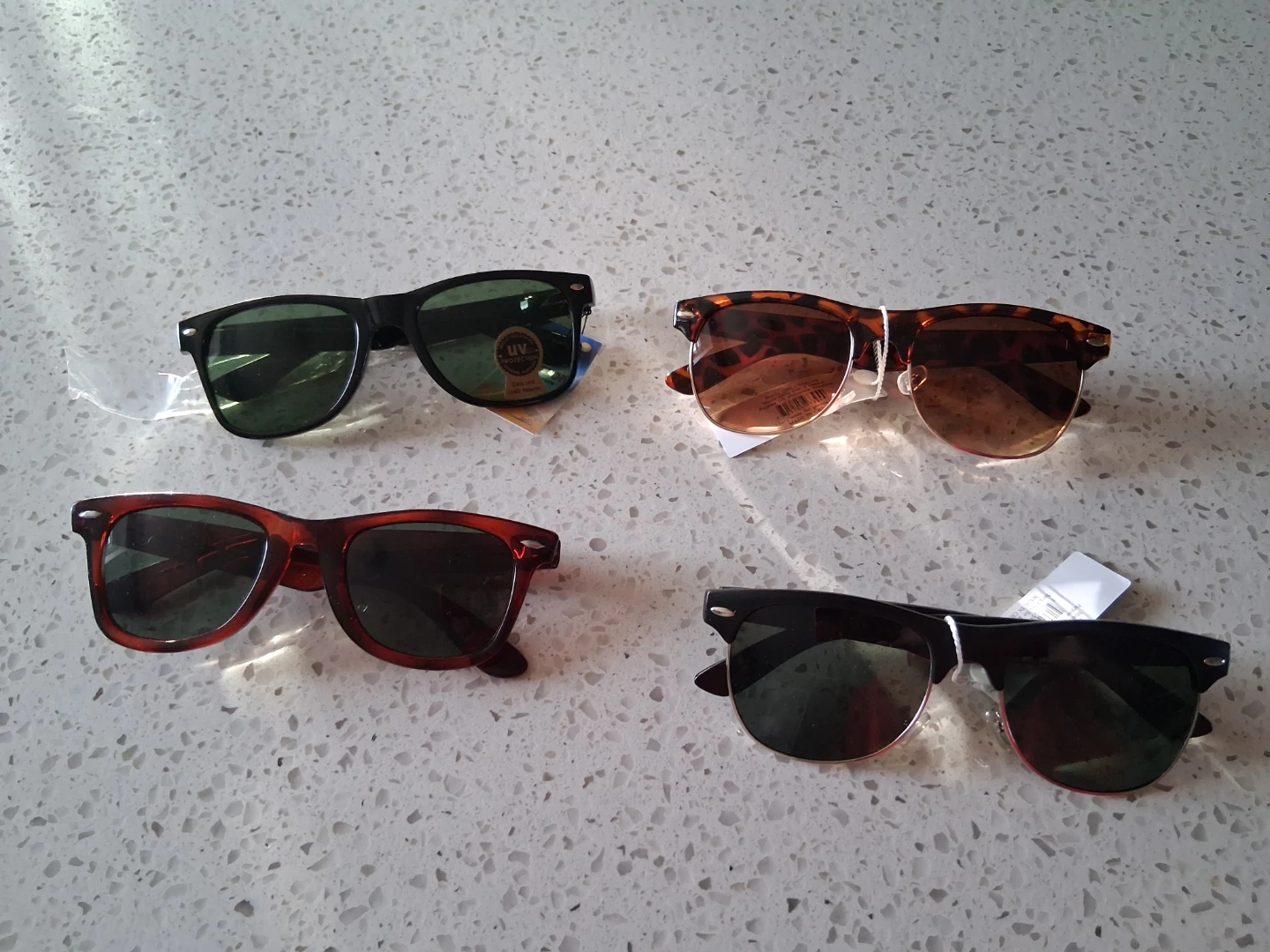 4 pairs of sunglasses