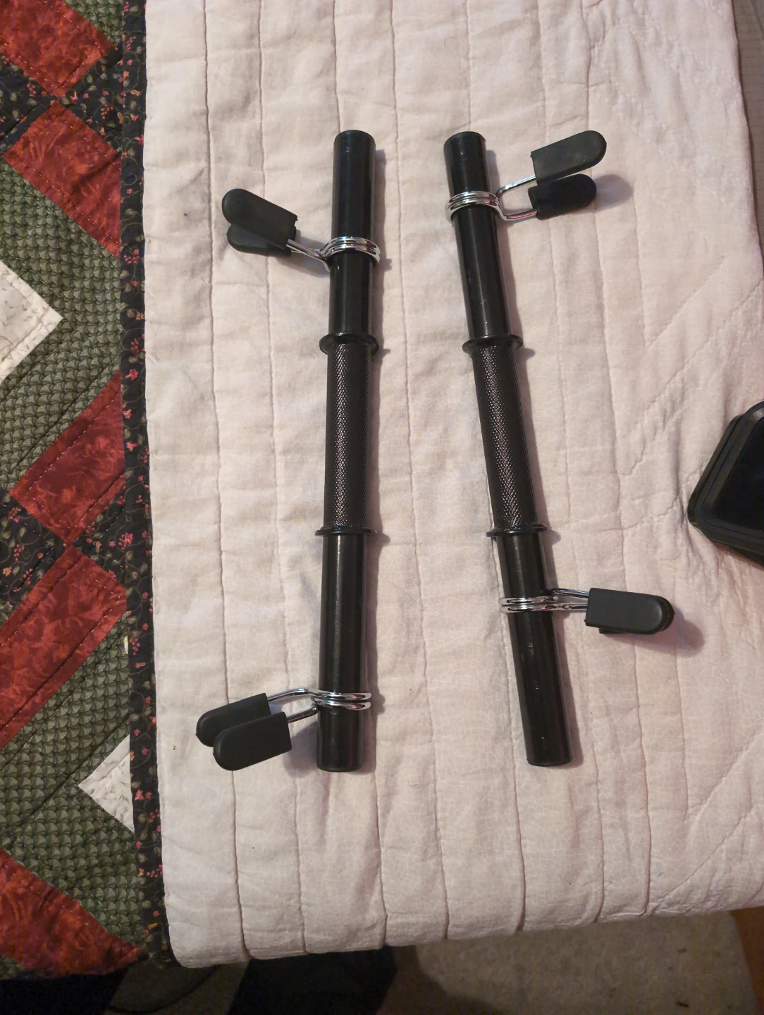 Pair of black dumbbell handles
