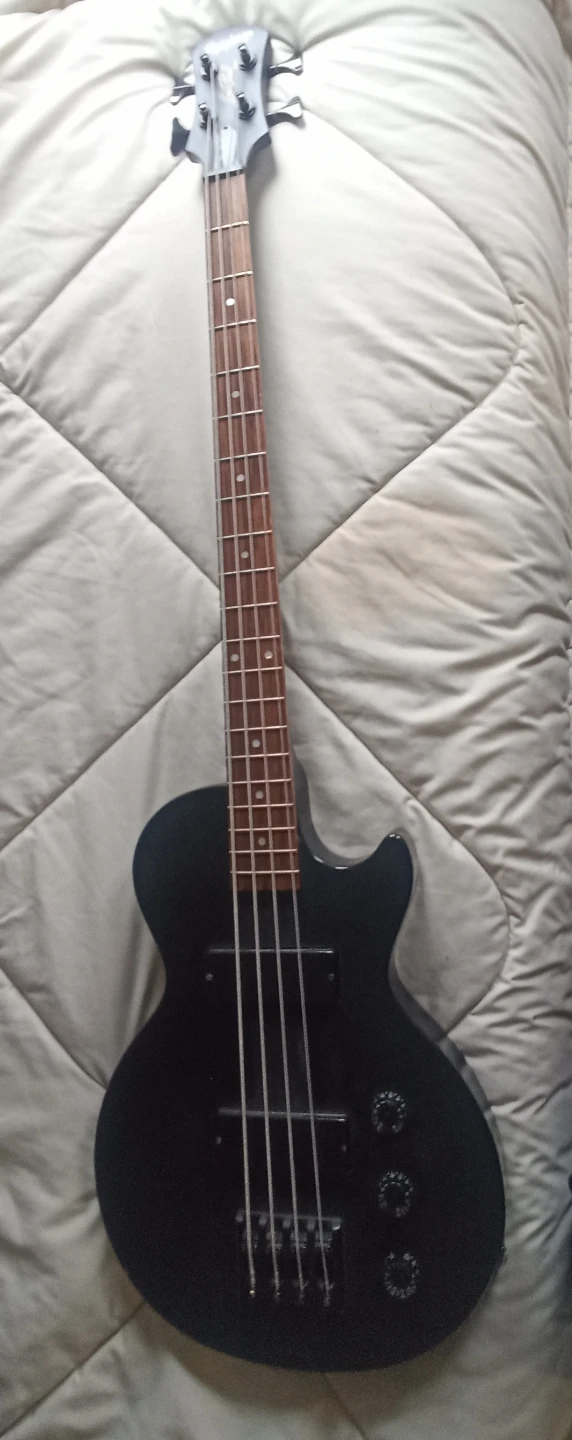 4 string, Epiphone Les Paul Special Bass.With 2 pick ups.