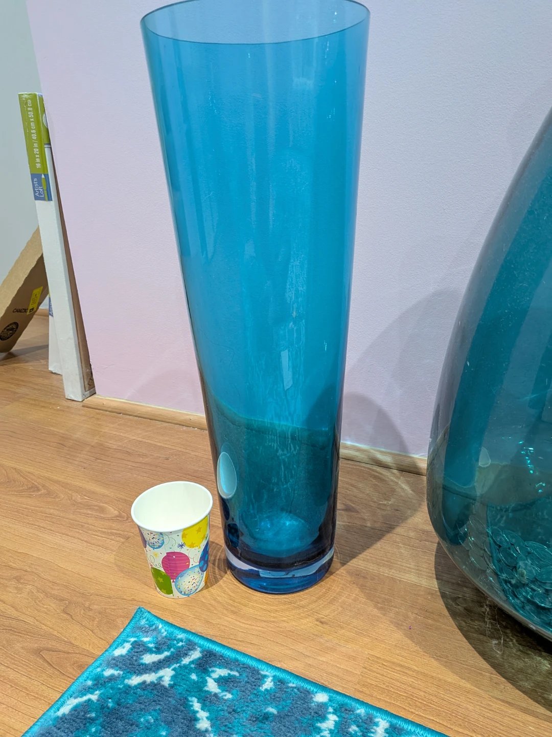 Tall blue glass floor vase