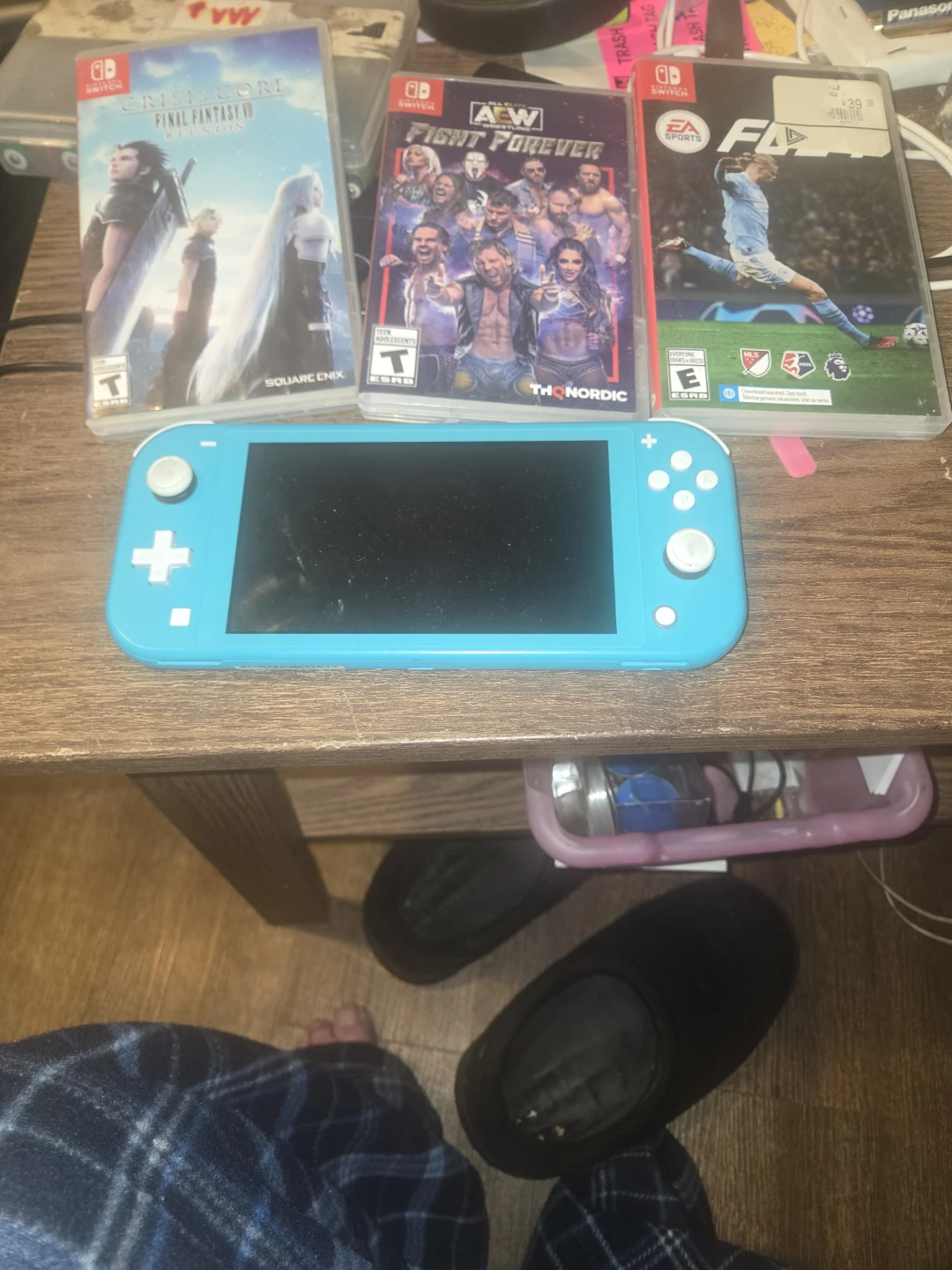 Nintendo Switch Lite Turquoise with 3 Games