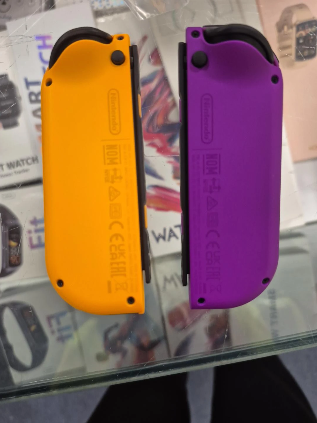 Nintendo Switch Joy-Con Neon Purple and Neon Orange