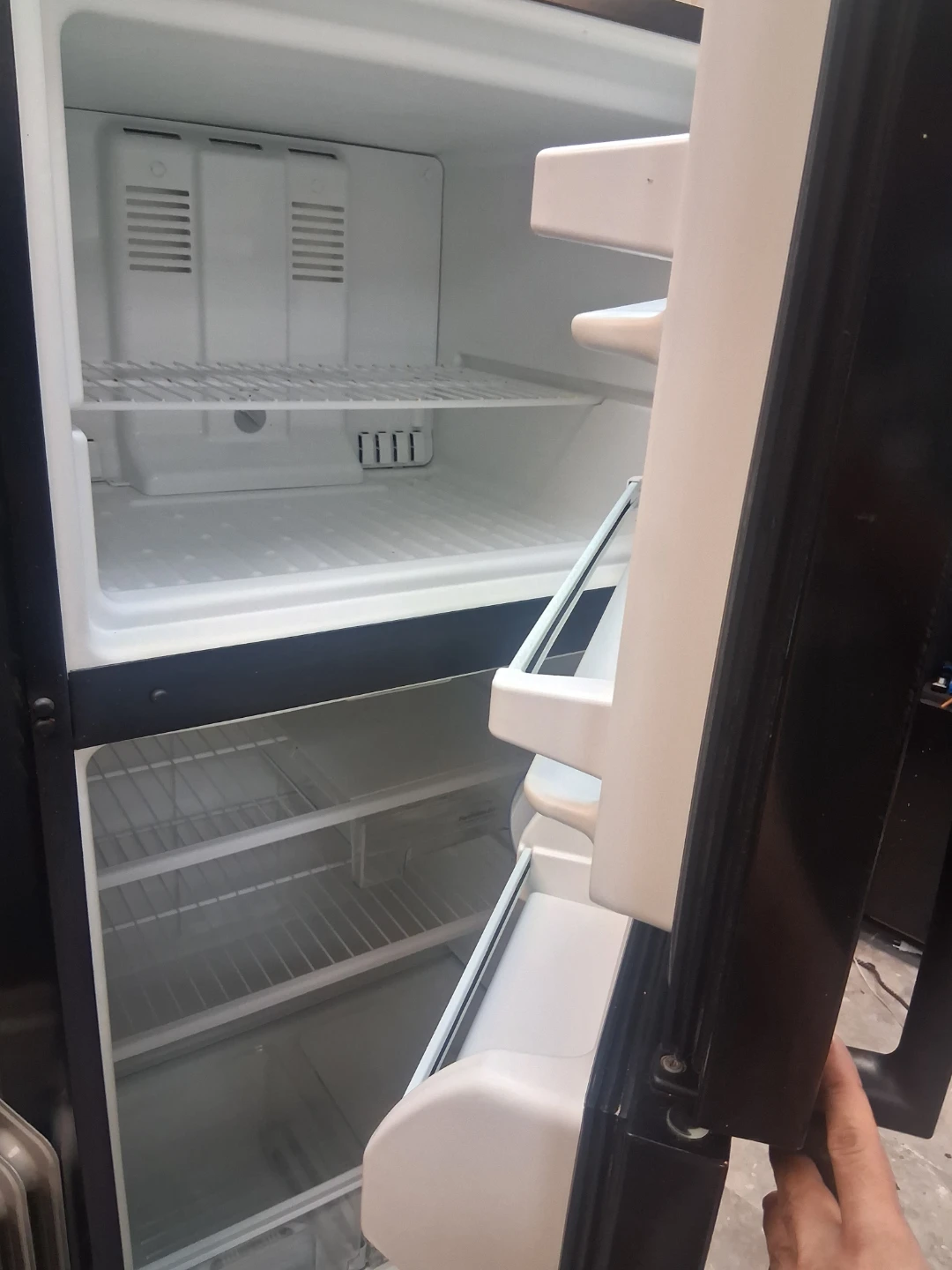 Black Whirlpool Top-Freezer Refrigerator - photo 2