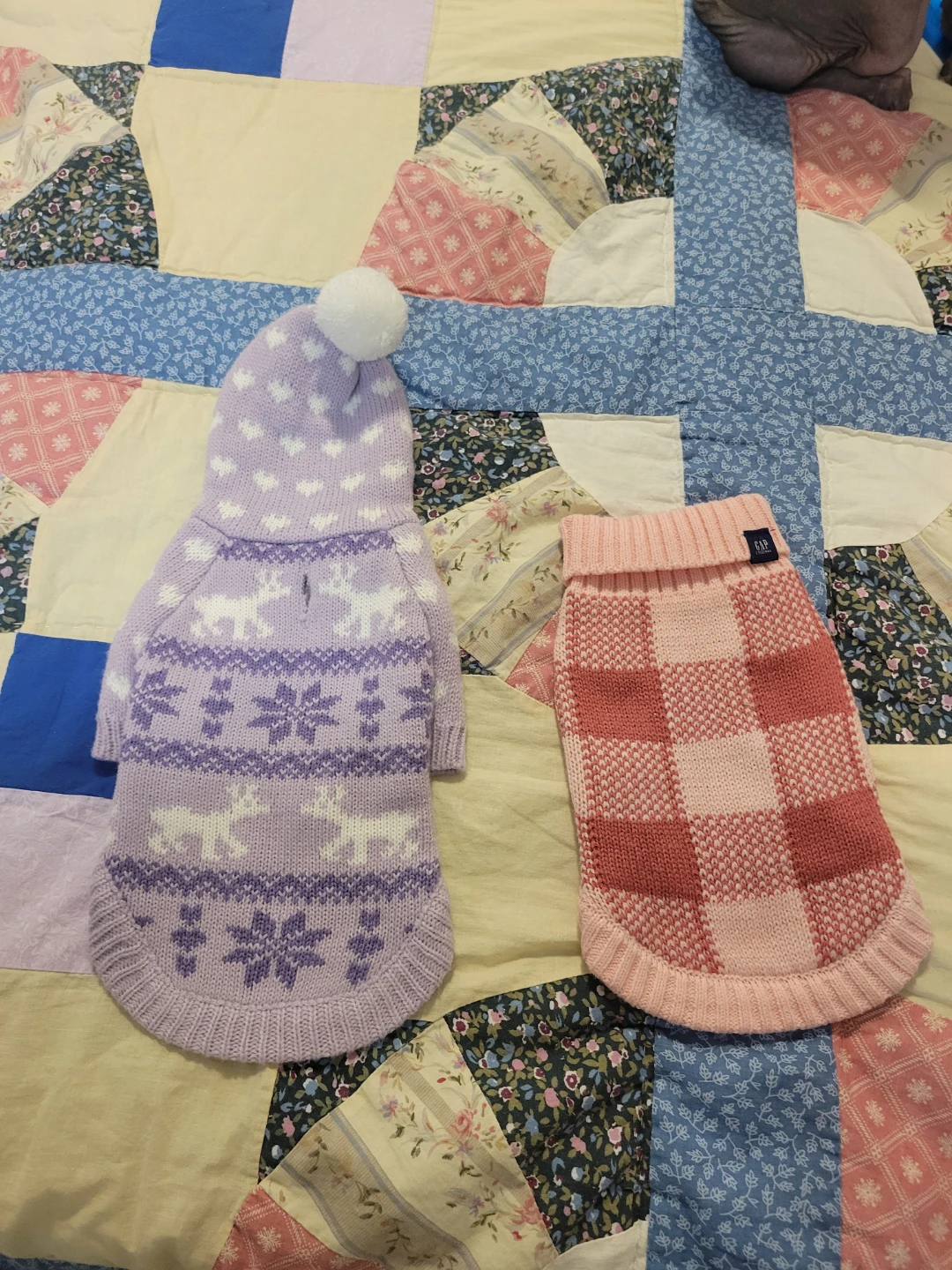Two knitted dog sweaters small size good for chihuahua.