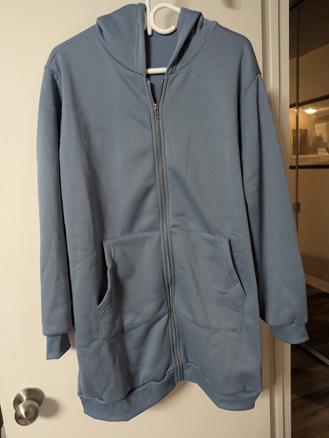 Blue zip-up hooded sweatshirt