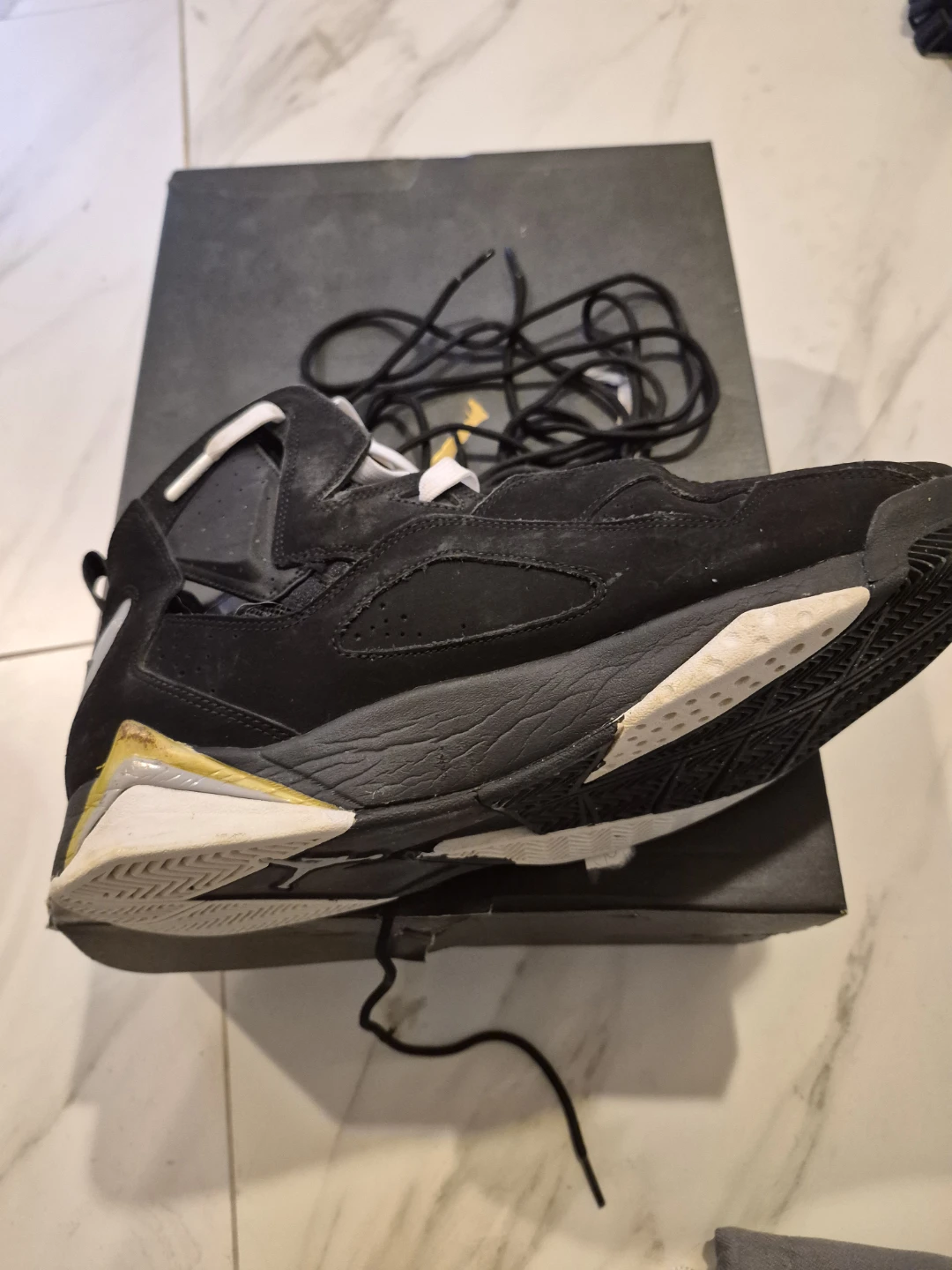 Air Jordan 7 Black and Gold Sneakers - photo 4