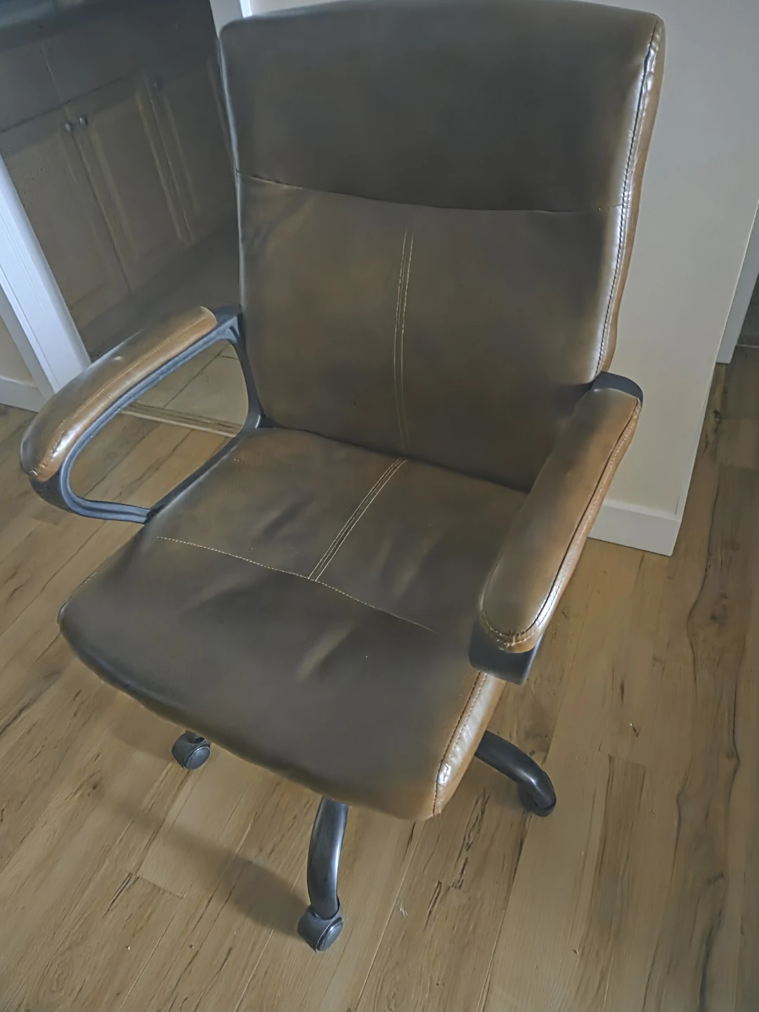 Brown faux leather office chair