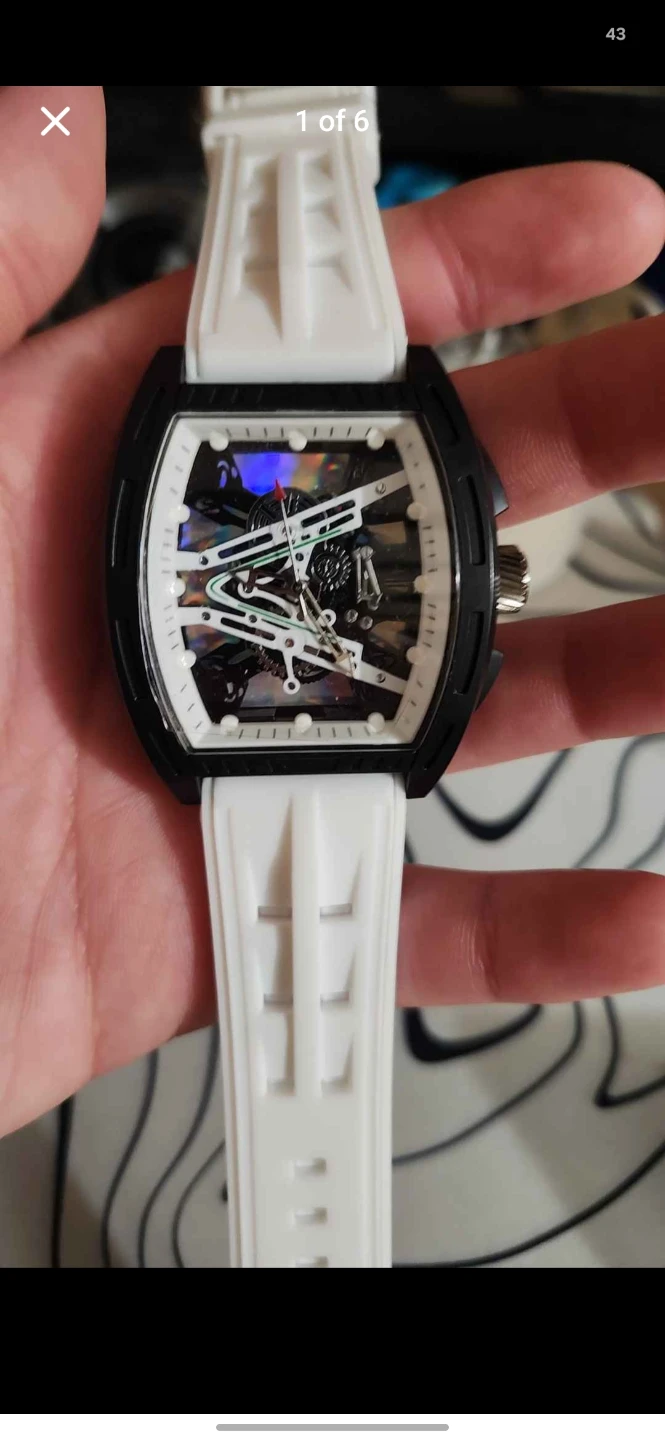 White skeleton watch with a silicone band
