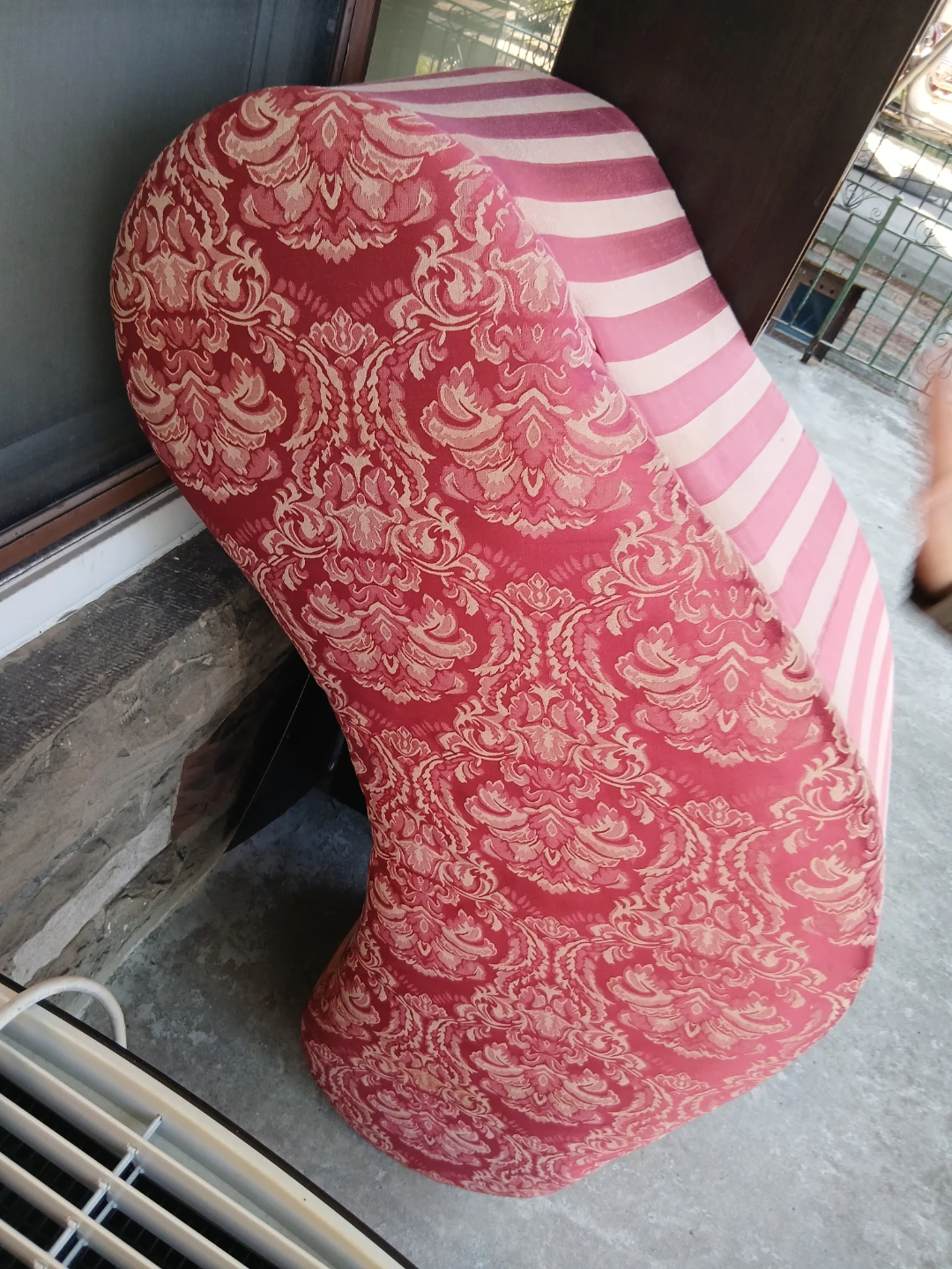 Upholstered curved accent chair
