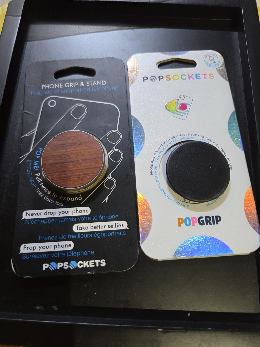 Two PopSockets Phone Grips and Stands