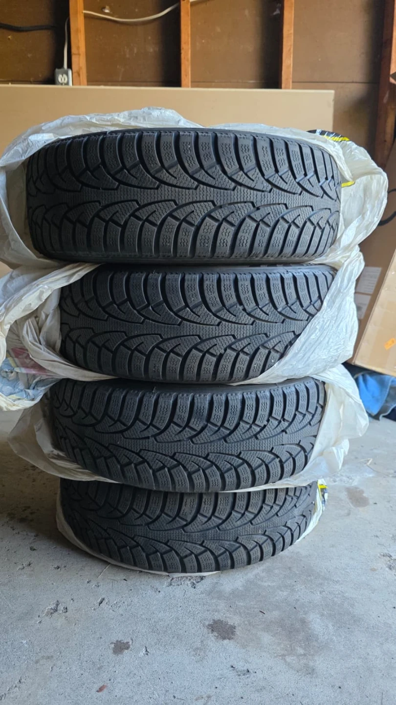 Set of 4 Winter Claw Sport SXI Tires with Rims - photo 2
