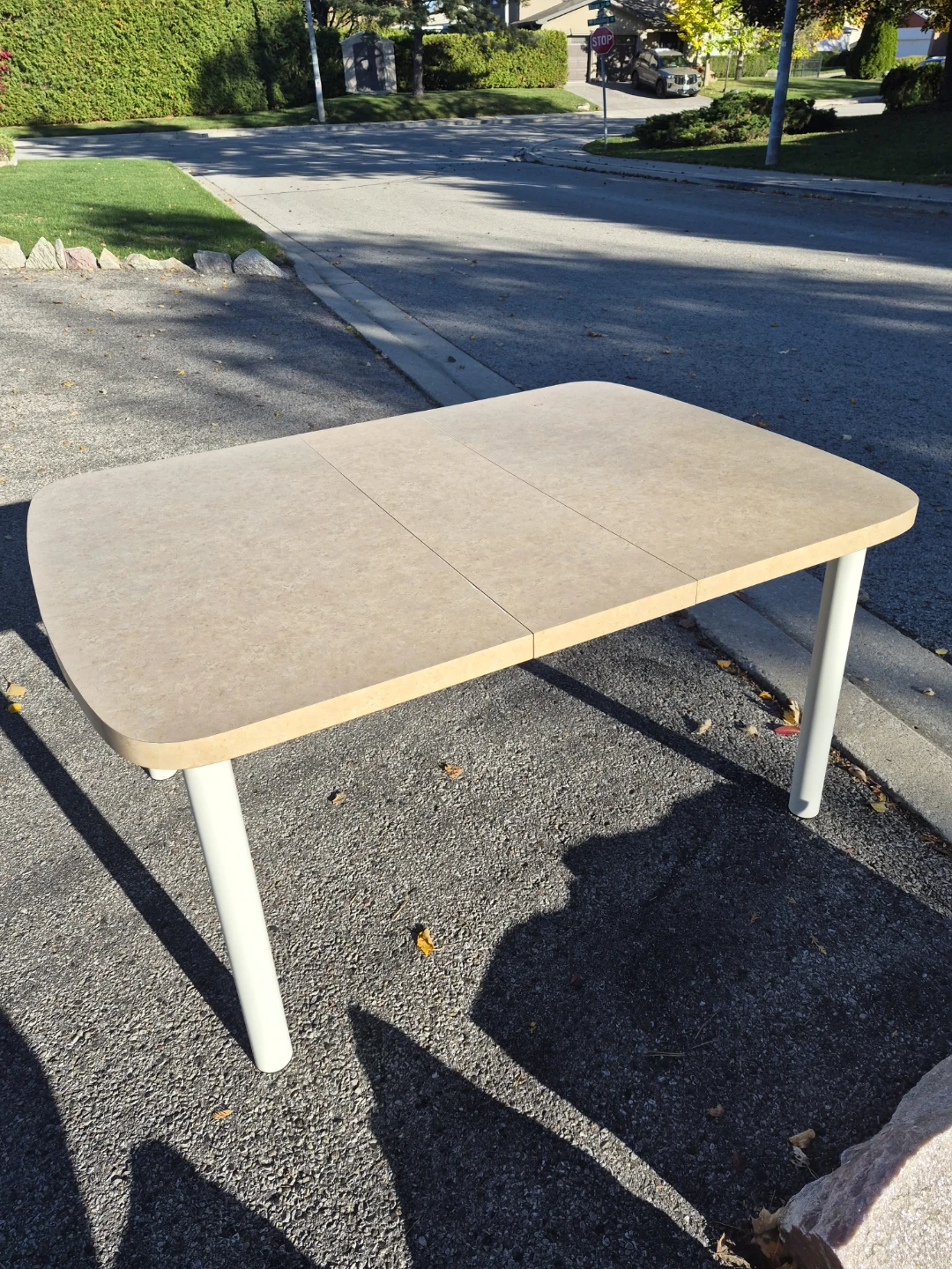 Kitchen table with extendable leaf.