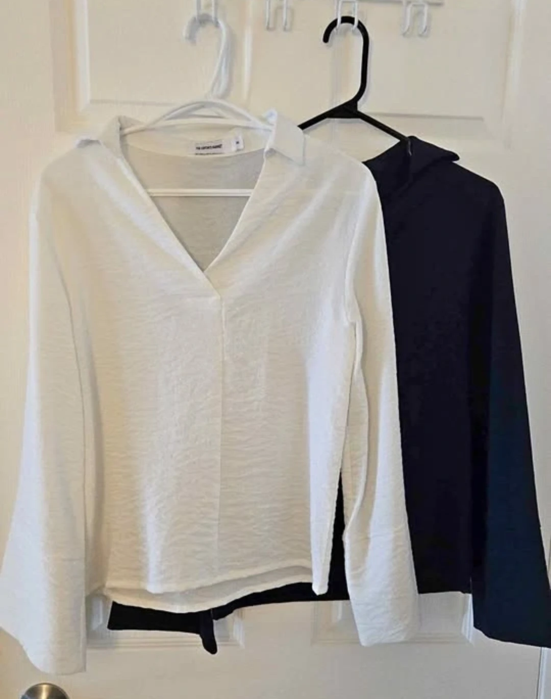 White & navy blouse from Singapore
