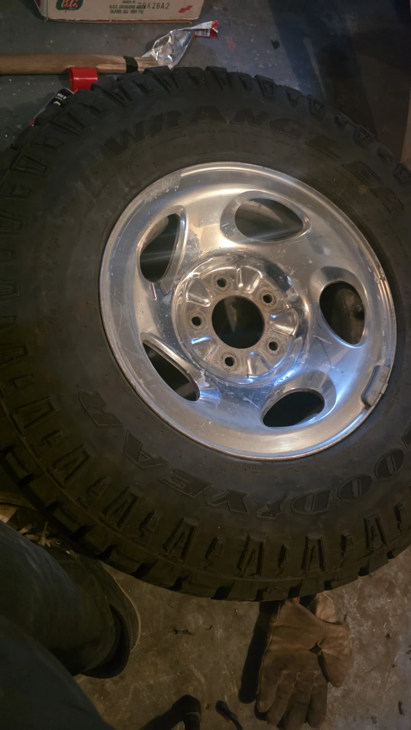 Goodyear Wrangler tire 265/70 R16 with aluminum 5 bolt Ford rim