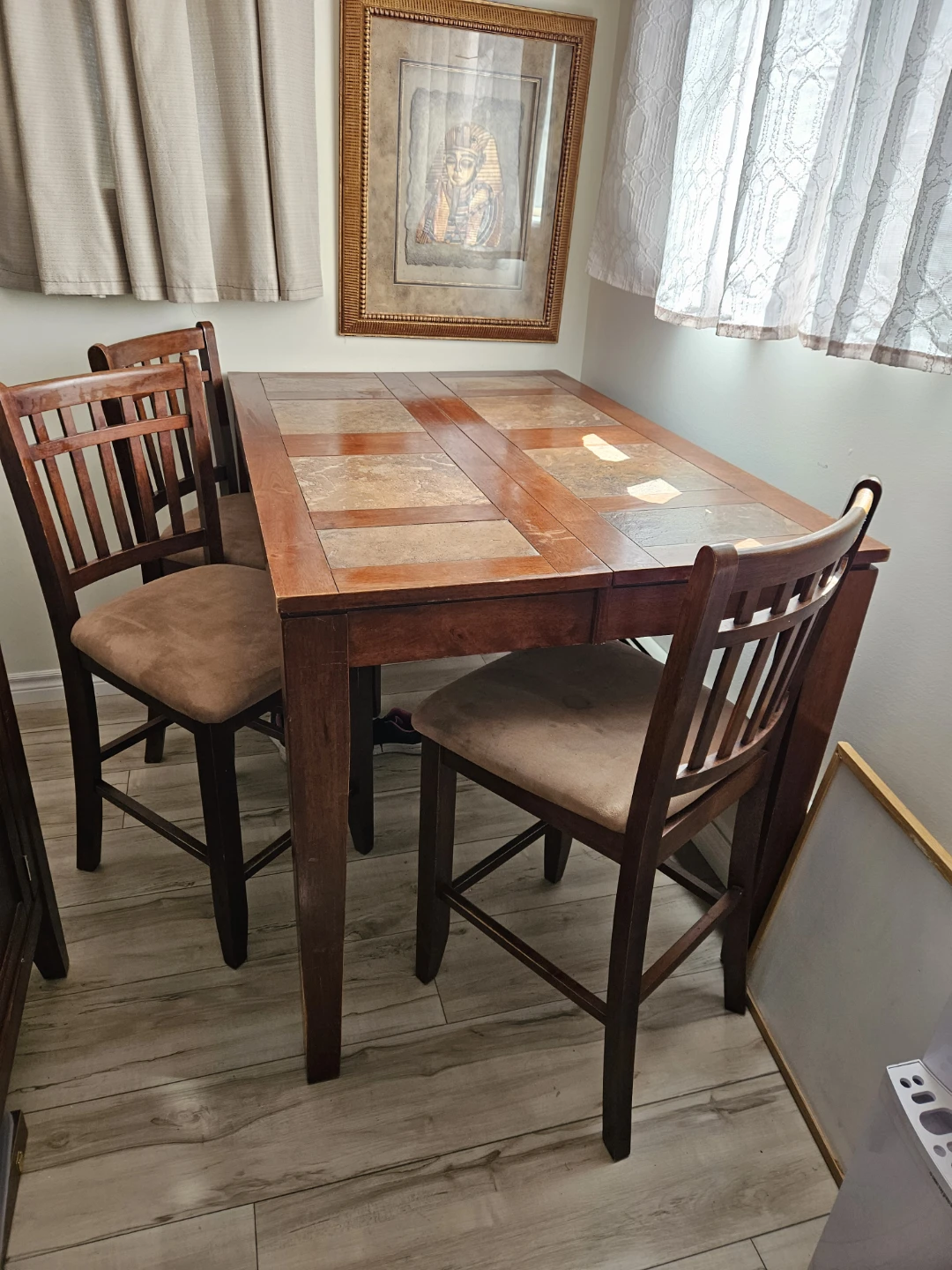 Wooden Sideboard with Stone Tile Top and dining room table.