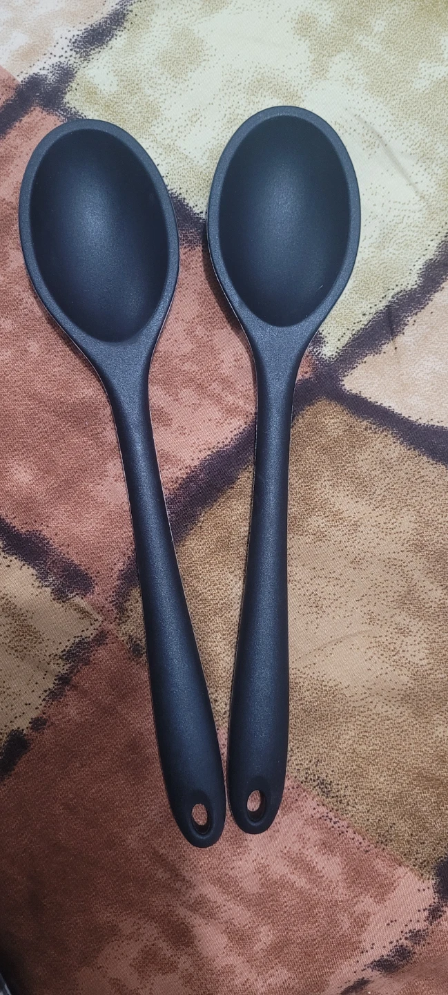 Two black silicone kitchen spatulas