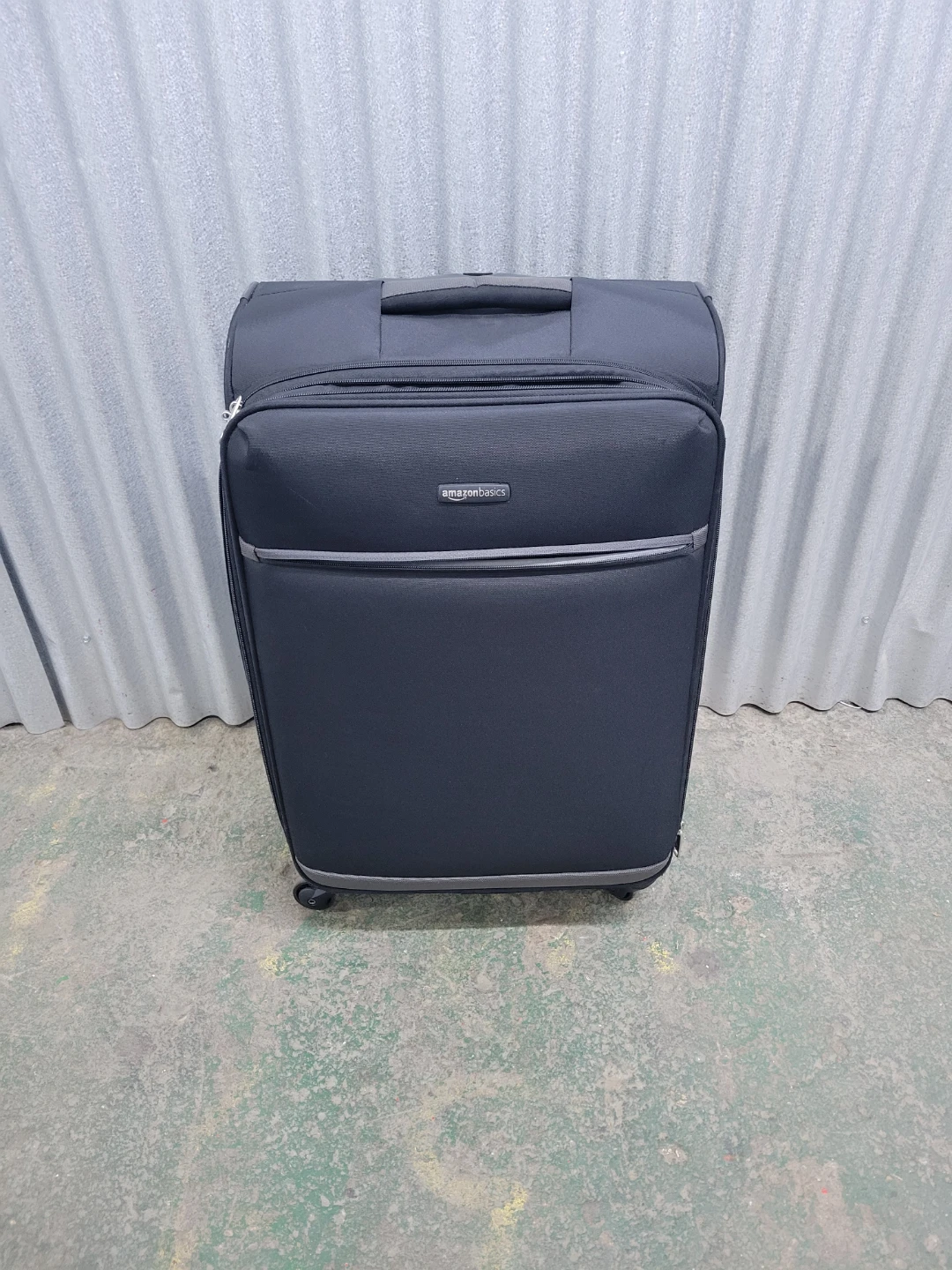 AmazonBasics Black Spinner Suitcase