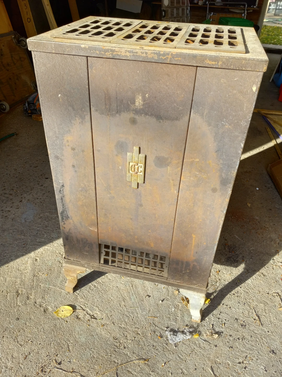 Antique cast iron gas heater