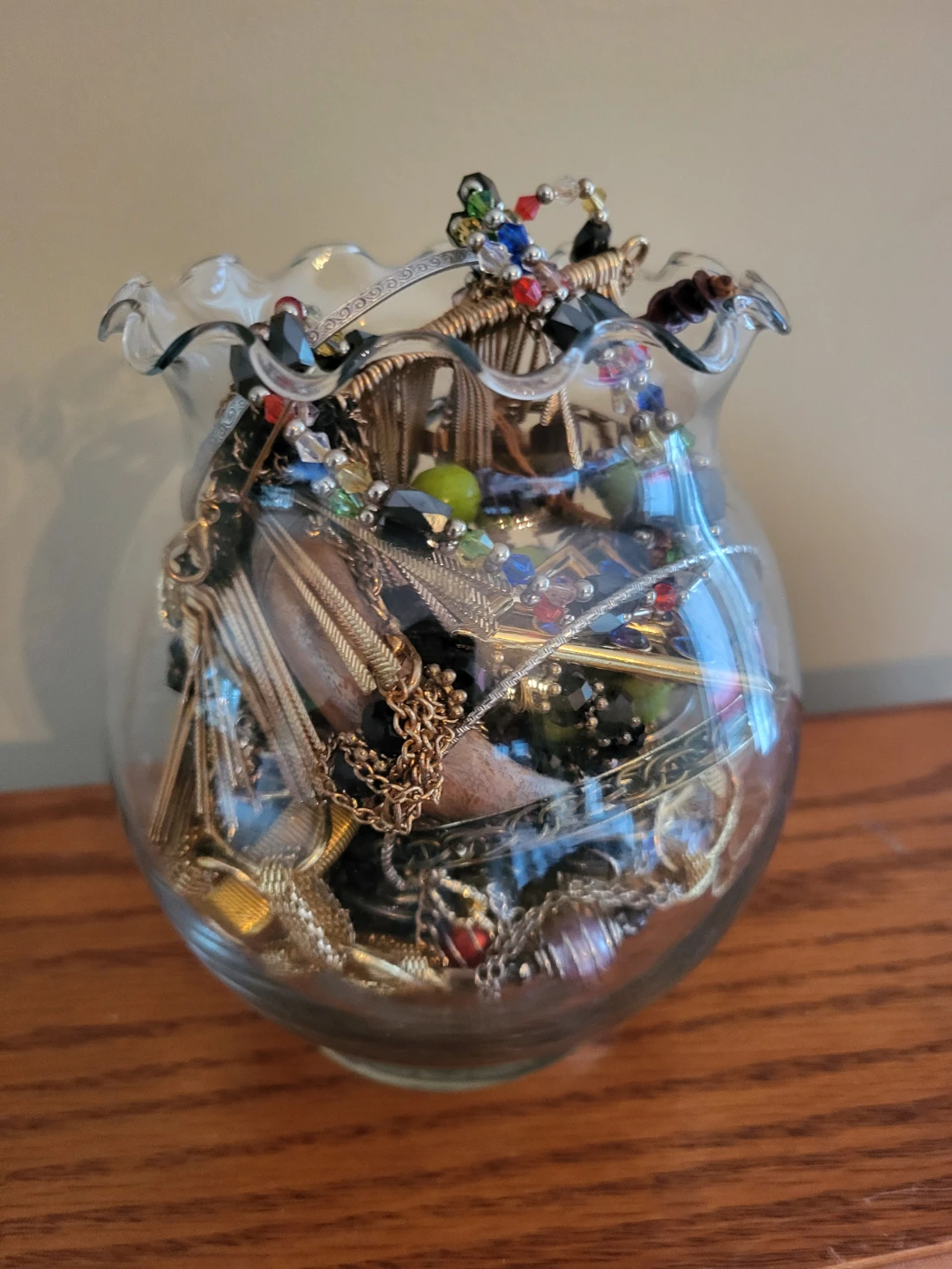 Assorted Costume Jewelry in Decorative Glass Vase
