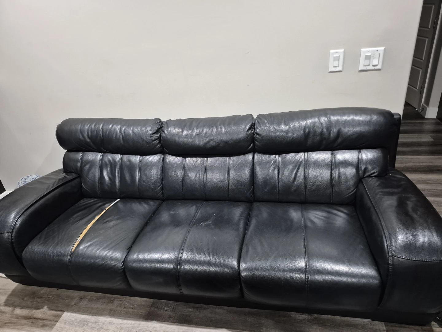 Black leather sofa