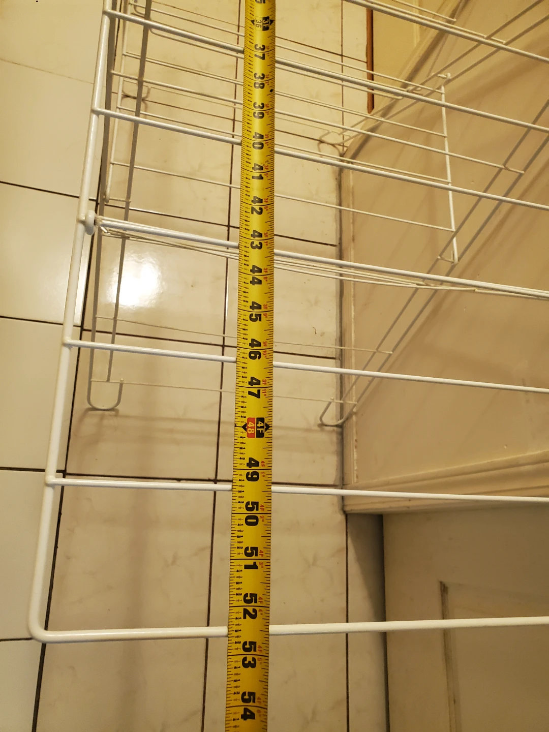 Collapsible white metal laundry drying rack - photo 5