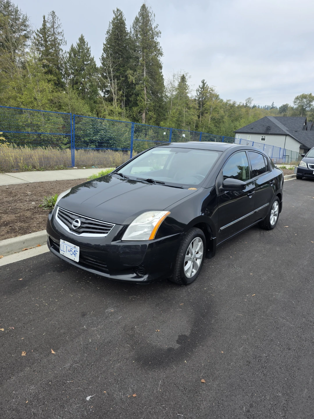 Black Nissan Sentra SL Sedan